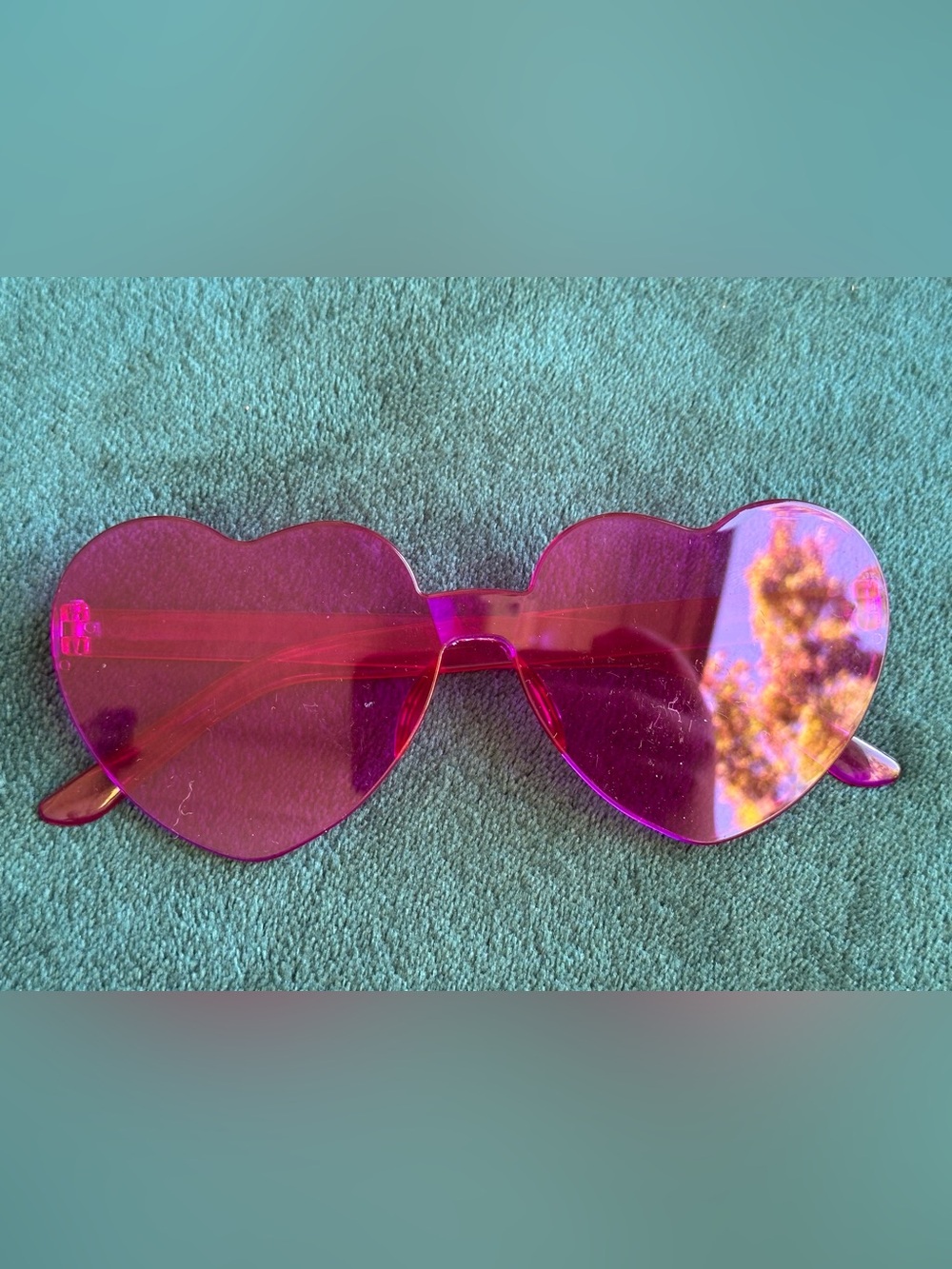 Purple/pink heart shaped glasses